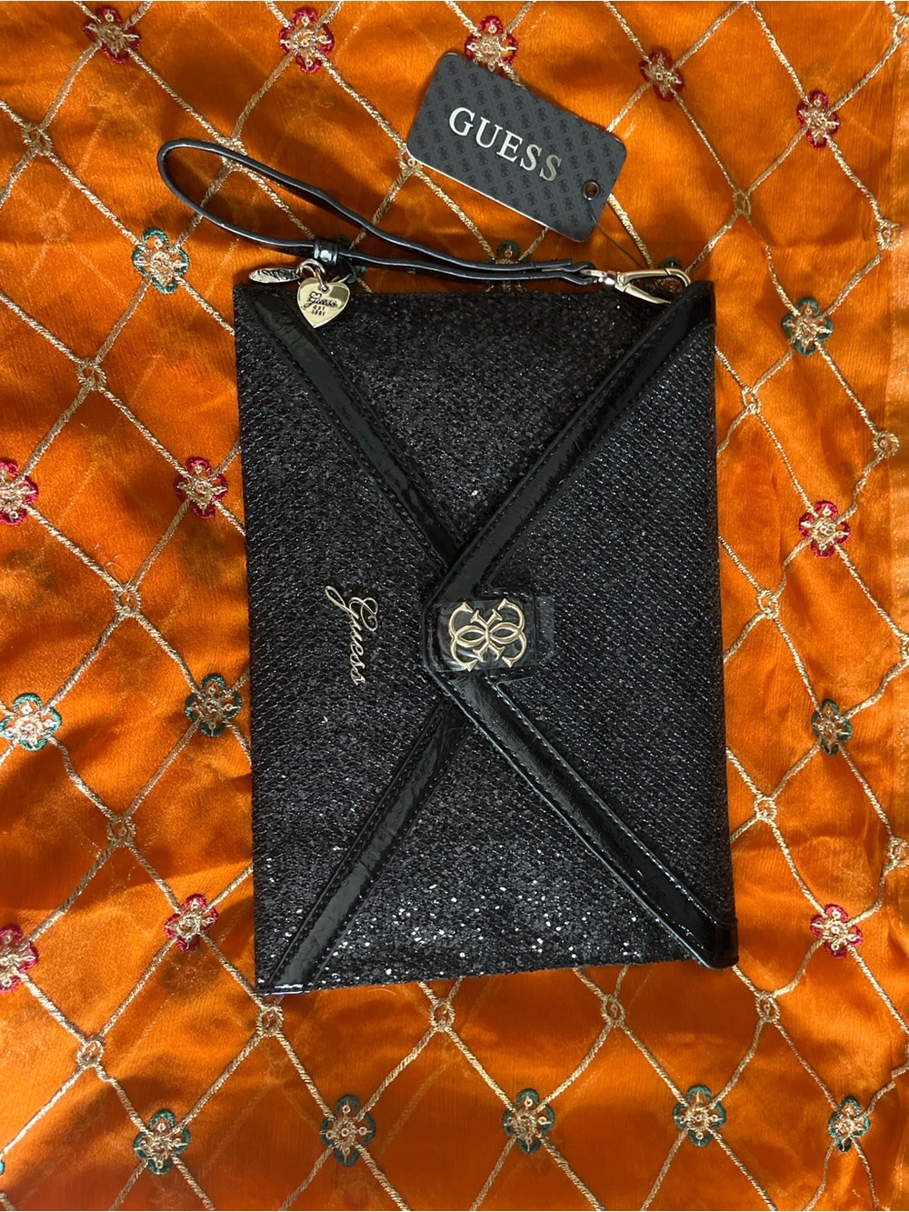 GUESS Black Glitter clutch bag with cheetah interior